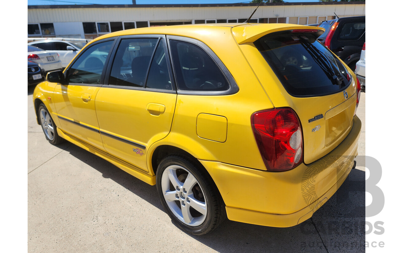 10/2002 Mazda 323 Astina SP20  5d Hatchback Yellow 2.0L