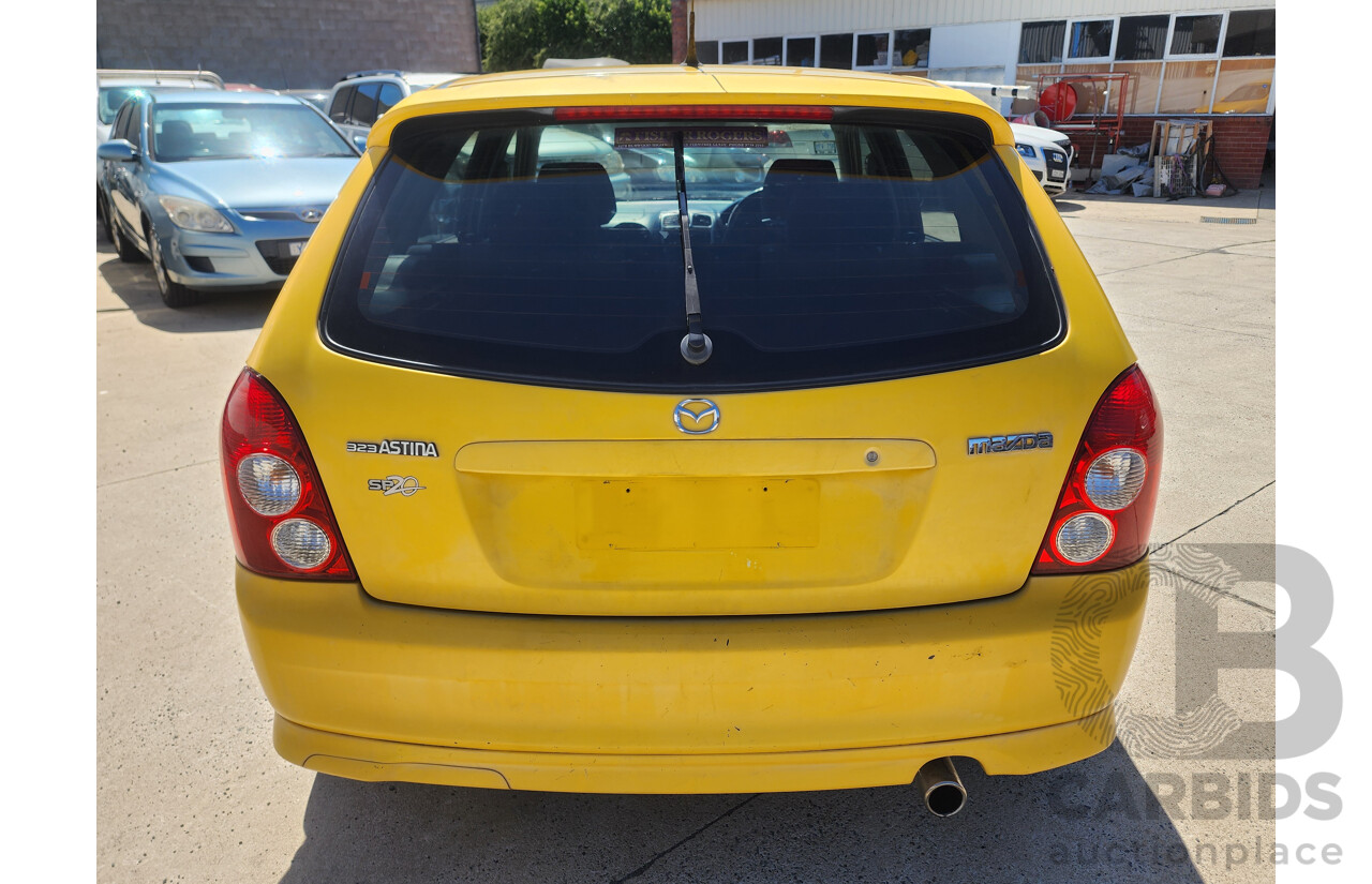 10/2002 Mazda 323 Astina SP20  5d Hatchback Yellow 2.0L