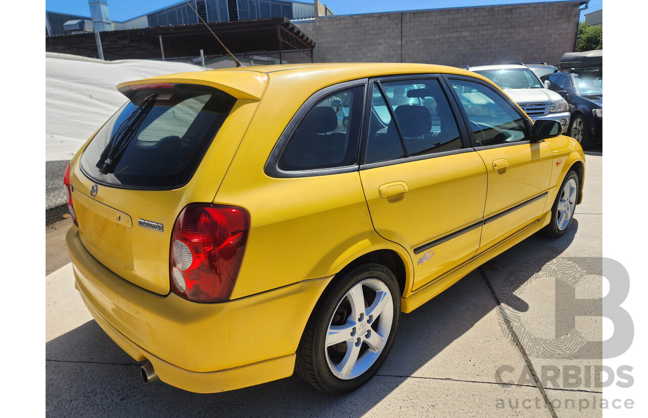 10/2002 Mazda 323 Astina SP20  5d Hatchback Yellow 2.0L