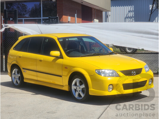 10/2002 Mazda 323 Astina SP20  5d Hatchback Yellow 2.0L