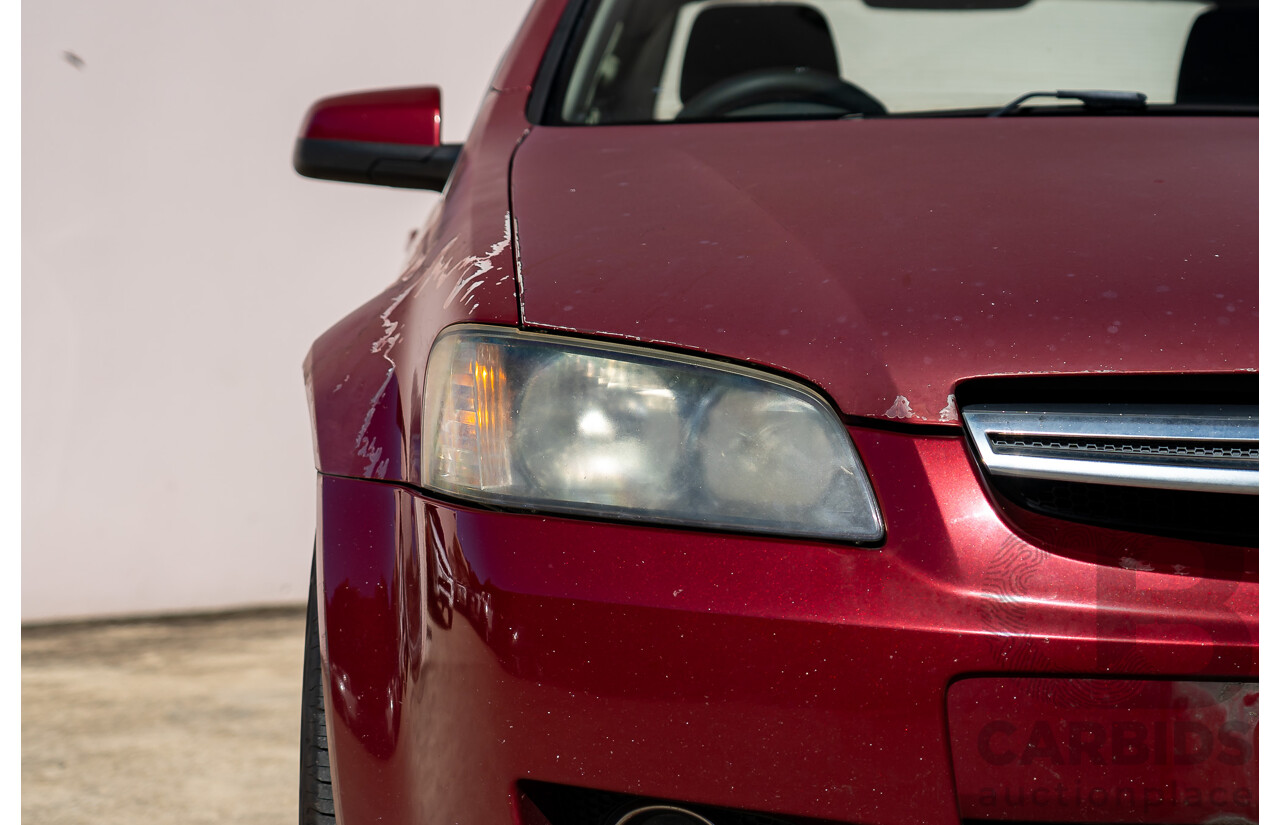 11/2007 Holden Berlina VE 4d Sedan Red V6 3.6L