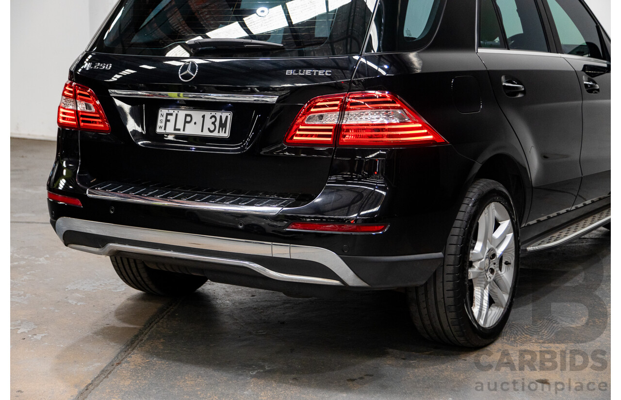 10/2014 Mercedes Benz ML250 CDI Bluetec (AWD) W166 MY14 4d Wagon Obsidian Black Turbo Diesel 2.1L