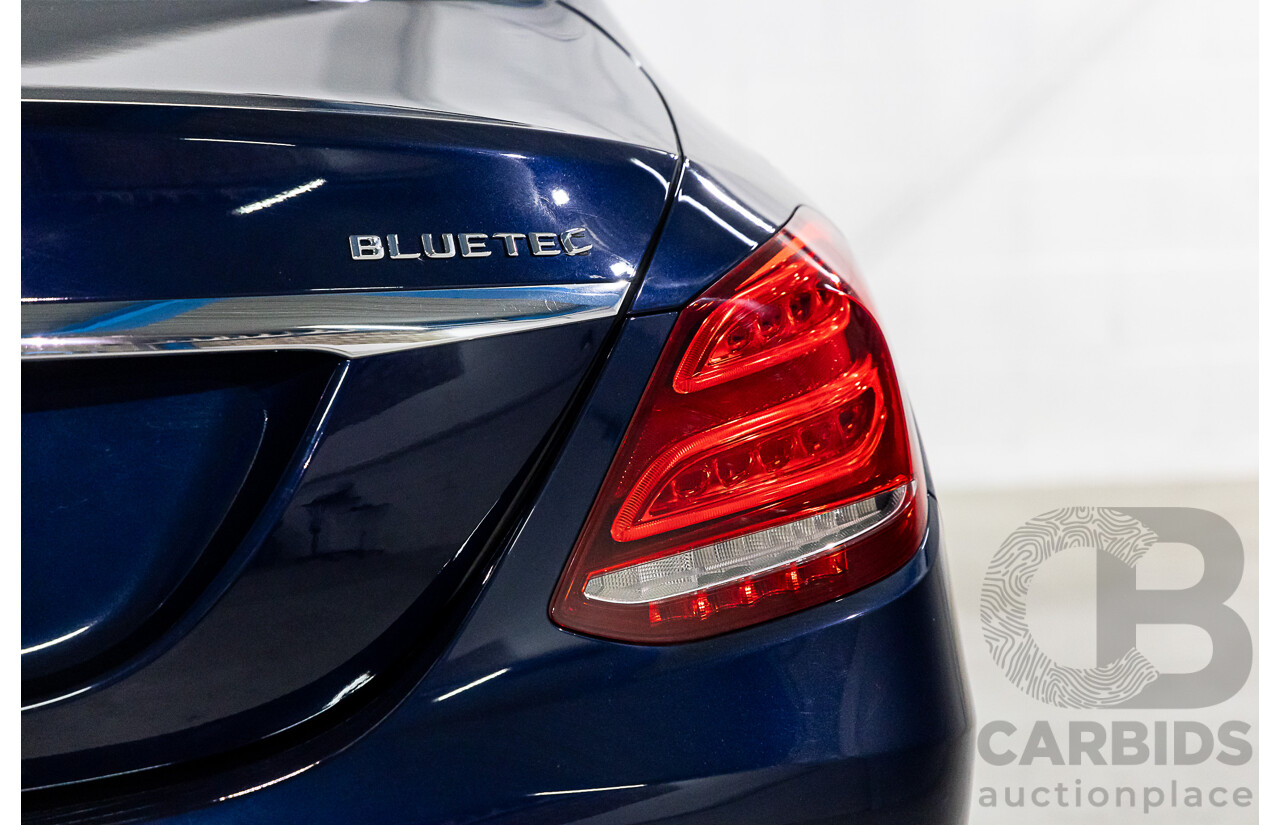 2/2015 Mercedes-Benz C200 Bluetec 205 4d Sedan Cavansite Blue Metallic Turbo Diesel 1.6L