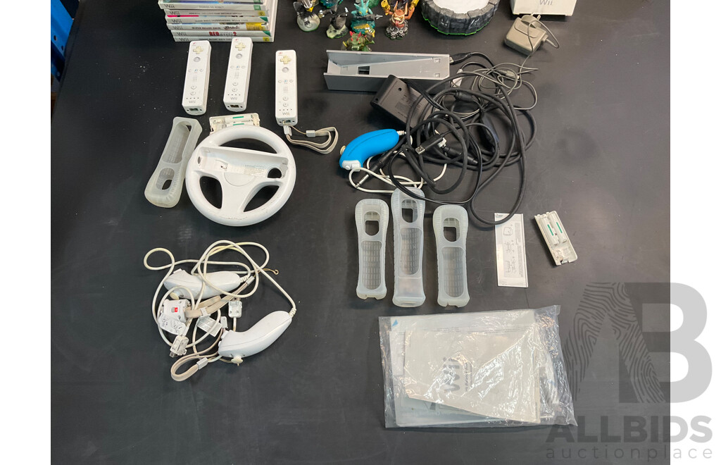 Assorted Nintendo Wii Items - Games, Nunchucks, Controllers, Skylanders Portal and Characters & Cables