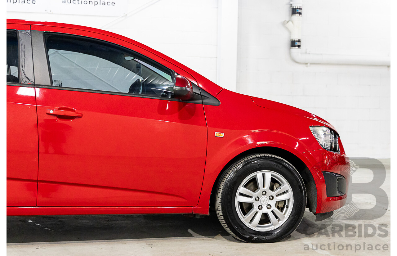 11/2015 Holden Barina CD TM MY15 4d Sedan Velvet Red 1.6L