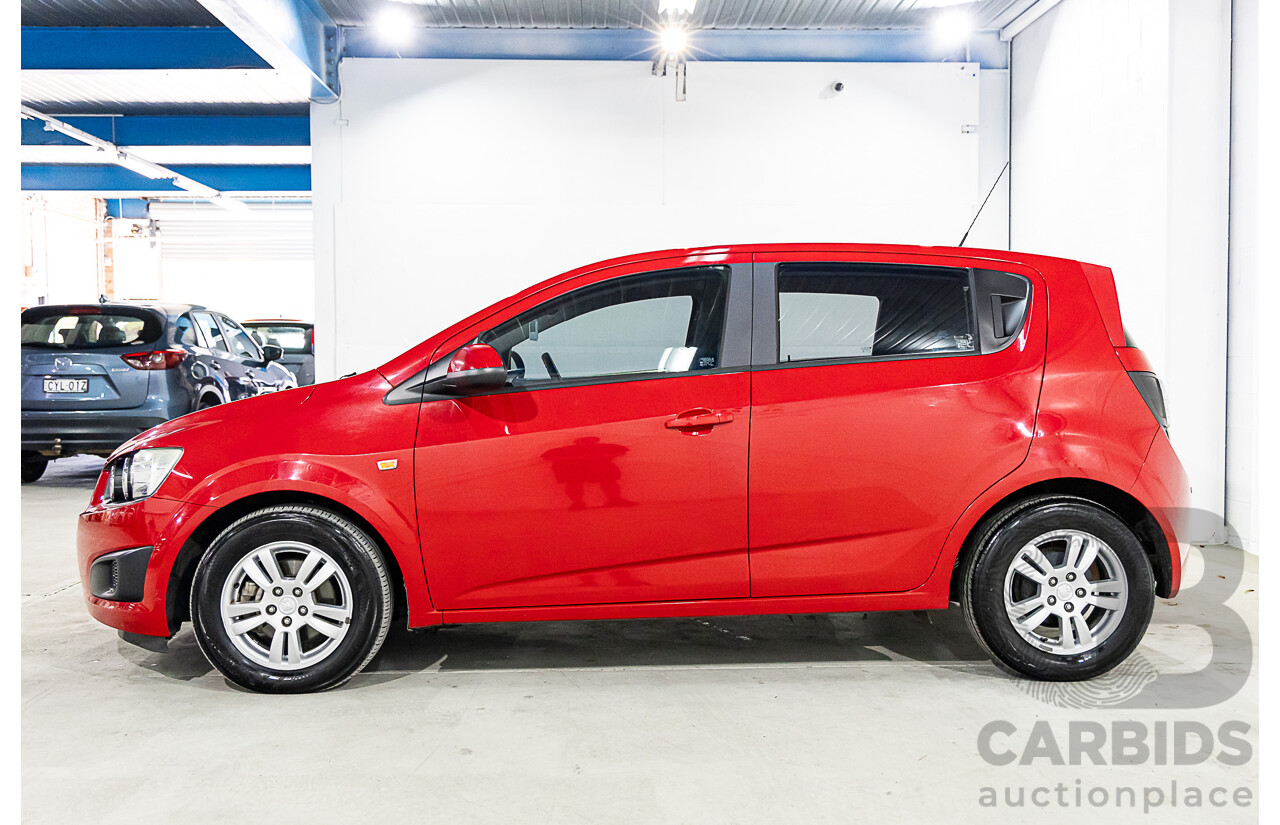 11/2015 Holden Barina CD TM MY15 4d Sedan Velvet Red 1.6L