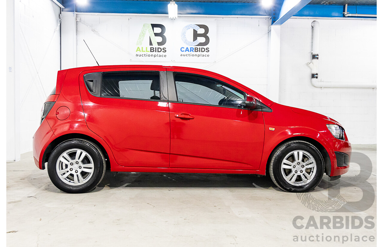 11/2015 Holden Barina CD TM MY15 4d Sedan Velvet Red 1.6L