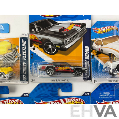 Ten Boxed Diecast Hot Wheels Vehicles Including 1970 Monte Carlo, 1970 Road Runner, Oldsmobile 442