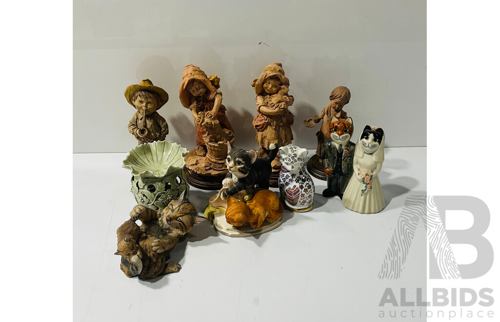 Collection of Ceramic and Other Statues and Figure of Animals and Children in Unusual Poses