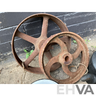 Two Antique Cast Iron Kettles, Two Cast Iron Pulley Wheels and Enameled Bowls