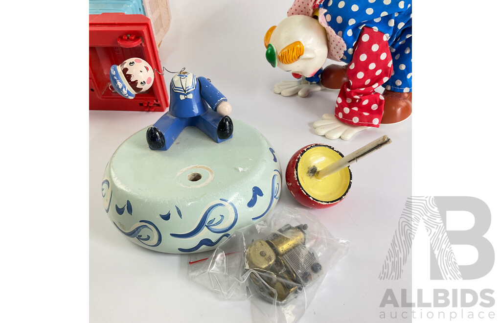 Collection of Vintage Toys Including Battery Powered Robot and Clown with Clock Work Carousel, Flower and Sailor