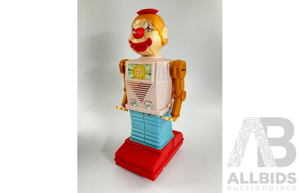 Collection of Vintage Toys Including Battery Powered Robot and Clown with Clock Work Carousel, Flower and Sailor