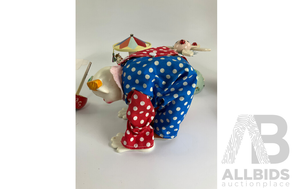 Collection of Vintage Toys Including Battery Powered Robot and Clown with Clock Work Carousel, Flower and Sailor