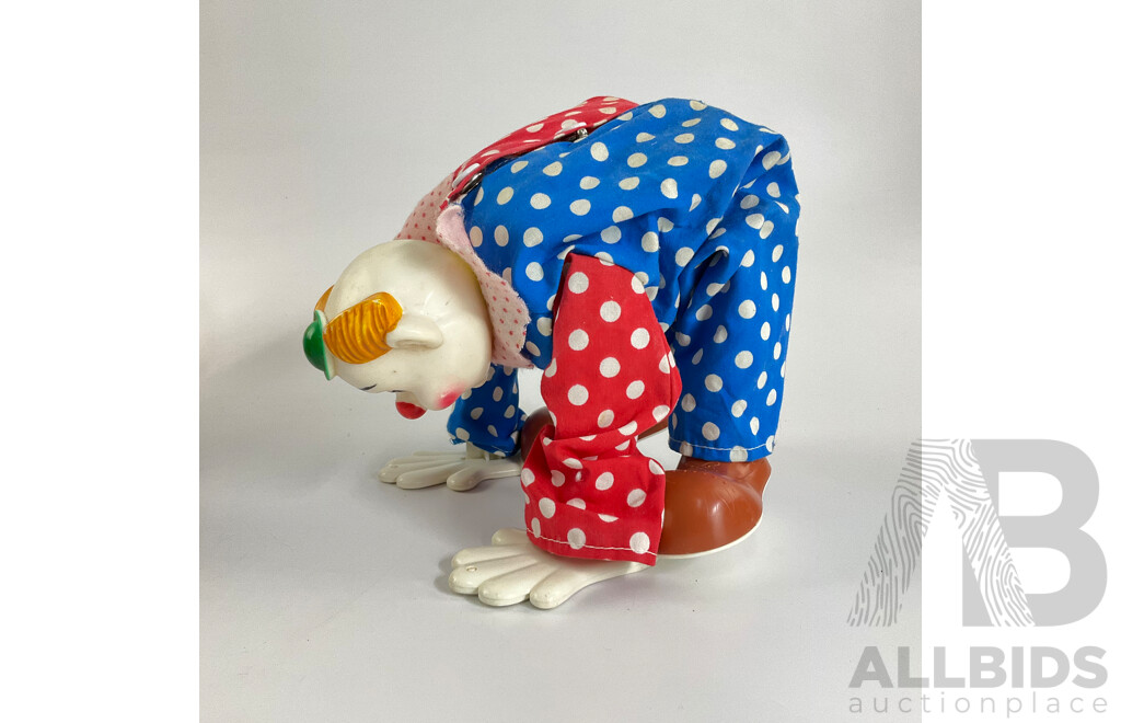 Collection of Vintage Toys Including Battery Powered Robot and Clown with Clock Work Carousel, Flower and Sailor