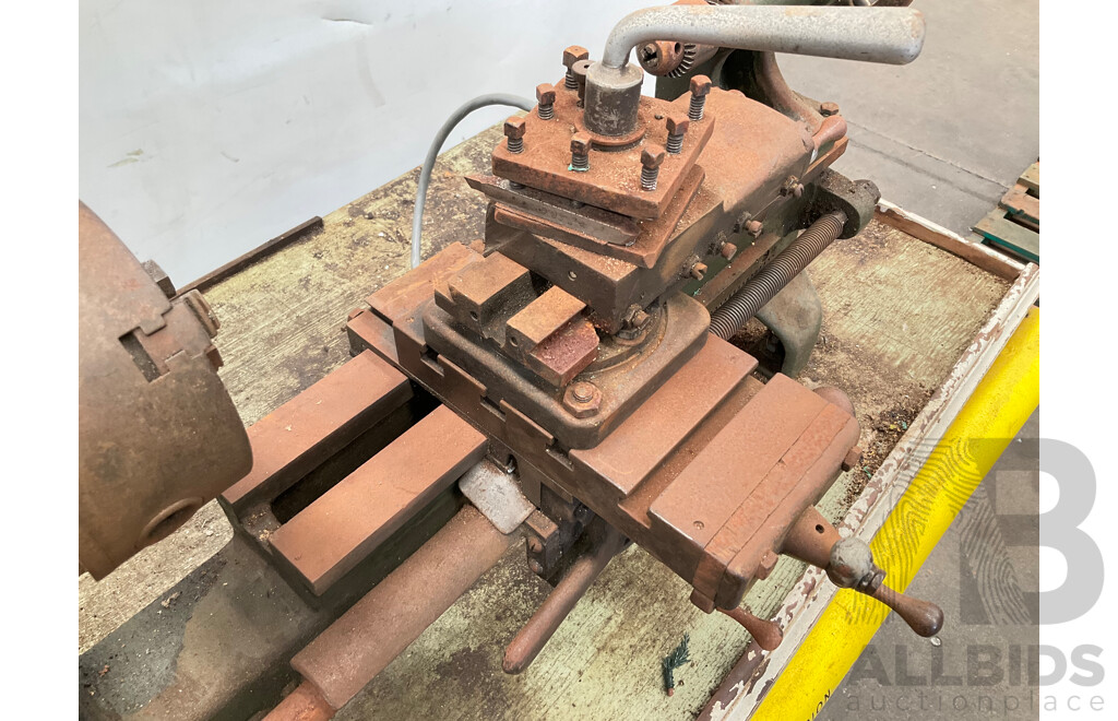 Antique Patrick Steel Lathe on Steel Bench with Various Cutting Tools, Chucks Drill Bits and Micrometer