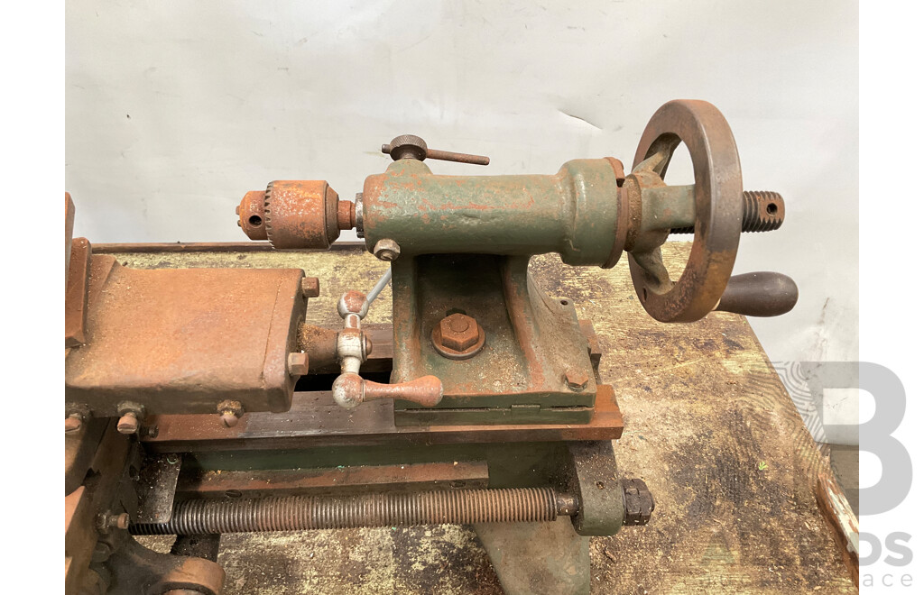 Antique Patrick Steel Lathe on Steel Bench with Various Cutting Tools, Chucks Drill Bits and Micrometer