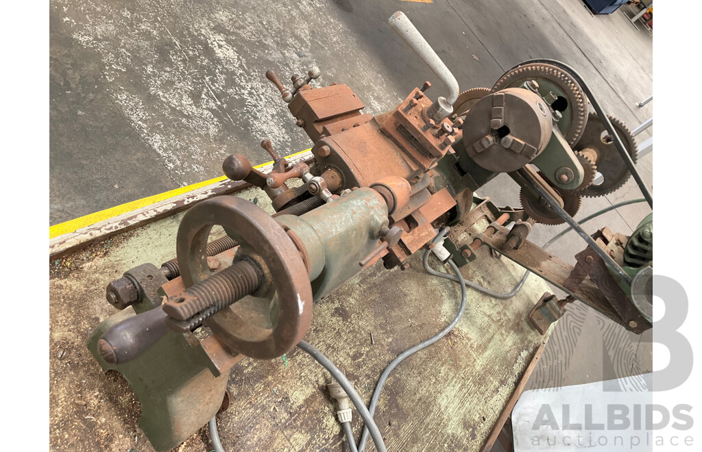 Antique Patrick Steel Lathe on Steel Bench with Various Cutting Tools, Chucks Drill Bits and Micrometer