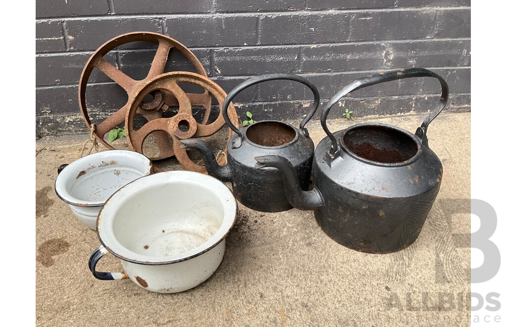 Two Antique Cast Iron Kettles, Two Cast Iron Pulley Wheels and Enameled Bowls