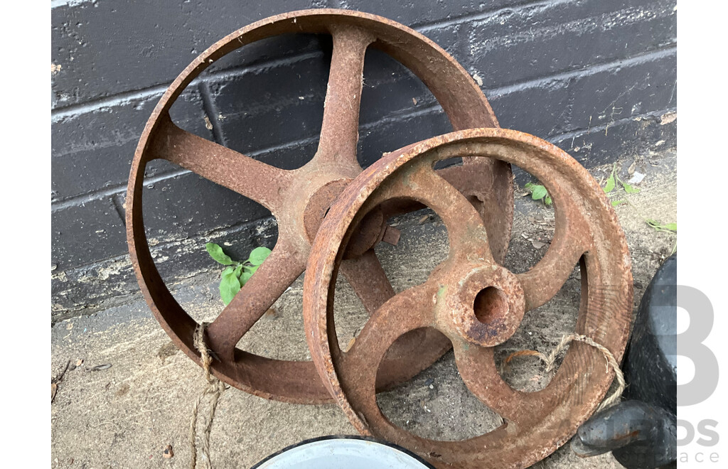 Two Antique Cast Iron Kettles, Two Cast Iron Pulley Wheels and Enameled Bowls