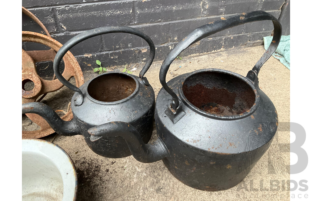 Two Antique Cast Iron Kettles, Two Cast Iron Pulley Wheels and Enameled Bowls