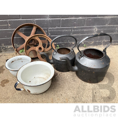 Two Antique Cast Iron Kettles, Two Cast Iron Pulley Wheels and Enameled Bowls