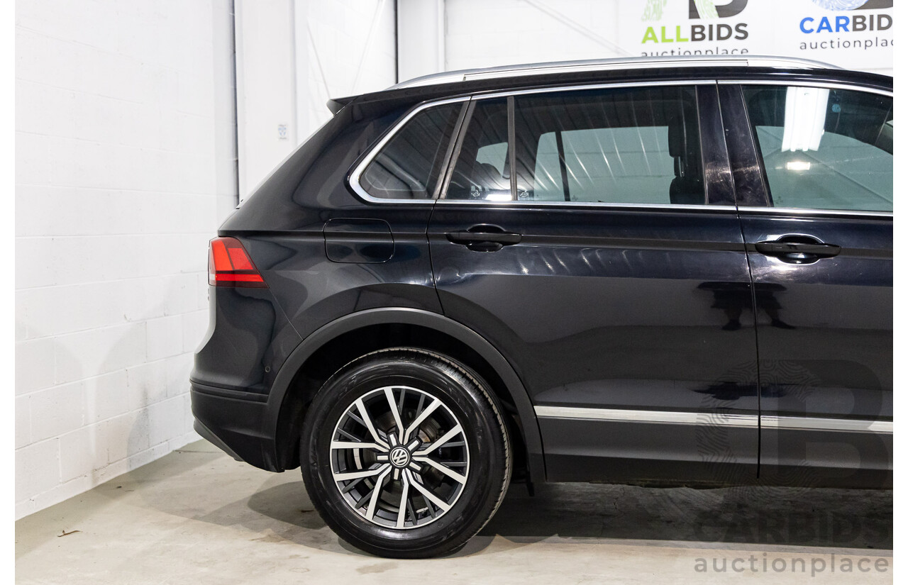 03/2017 Volkswagen Tiguan 132 TSI Comfortline (AWD) 5NA 4D Wagon Deep Black Pearl Turbo 2.0L