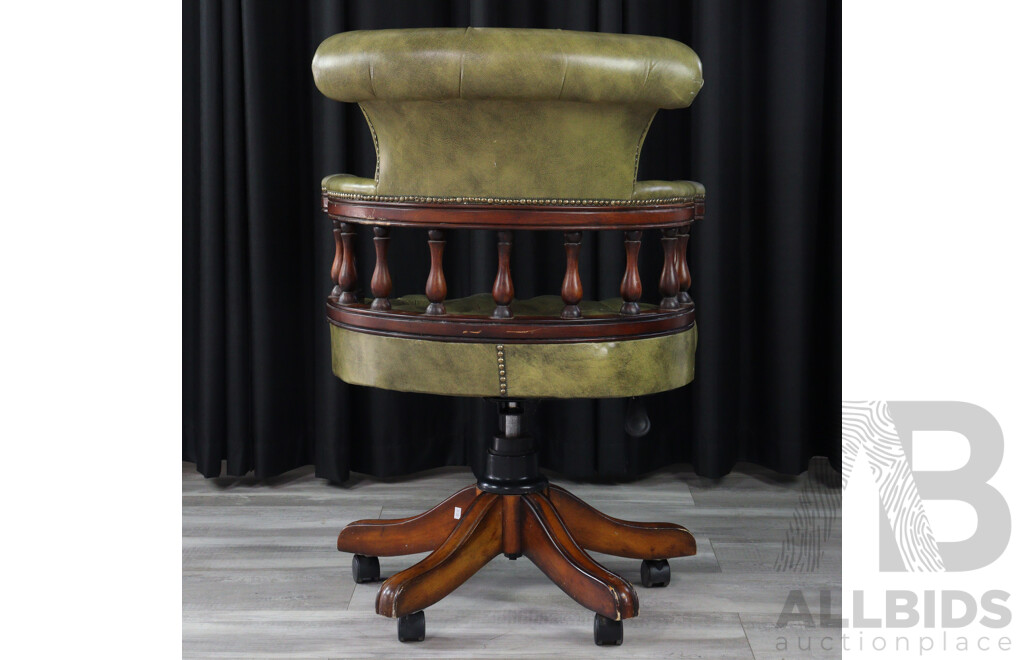 Reproduction Leather Upholstered Captains Chair