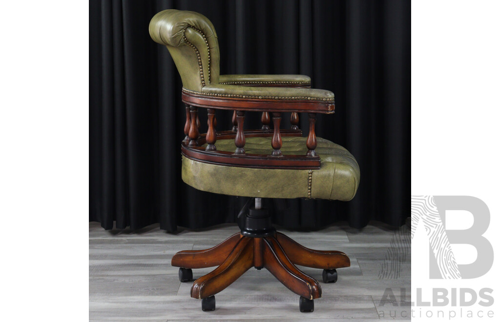 Reproduction Leather Upholstered Captains Chair