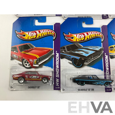 Ten Boxed Hot Wheels HW Showroom Vehicles Including Aston Martin DBS, 1968 Mercury Cyclone, 1964 Corvette Stingray