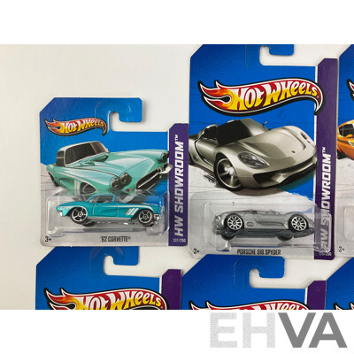 Ten Boxed Hot Wheels HW Showroom Vehicles Including Aston Martin DBS, 1968 Mercury Cyclone, 1964 Corvette Stingray
