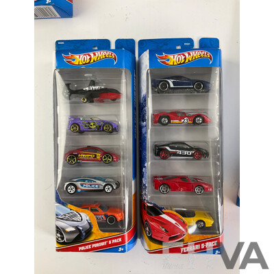 Seven Boxed Hot Wheels Five Packs Including Graffiti Riders, Indy 500, Police Pursuit, Ferrari, HW Tunerz, Hot Rods, World Racers