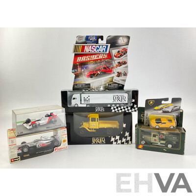 Assortment of Diecast Vehicles Including 1988 McLaren F! Ayrton Senna, Burago 2011 McLaren F1 Jenson Button, NASCAR Bashers, David Jones Trucks