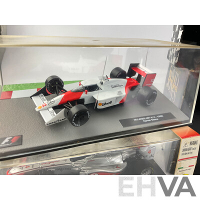 Assortment of Diecast Vehicles Including 1988 McLaren F! Ayrton Senna, Burago 2011 McLaren F1 Jenson Button, NASCAR Bashers, David Jones Trucks