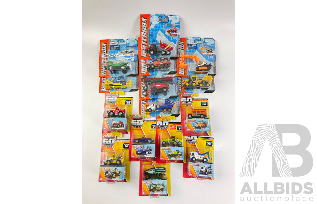 Collection of Boxed Diecast Matchbox 60th Anniversary Editions with Trucks and Construction Vehicles