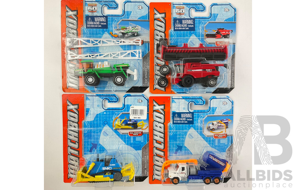 Collection of Boxed Diecast Matchbox 60th Anniversary Editions with Trucks and Construction Vehicles