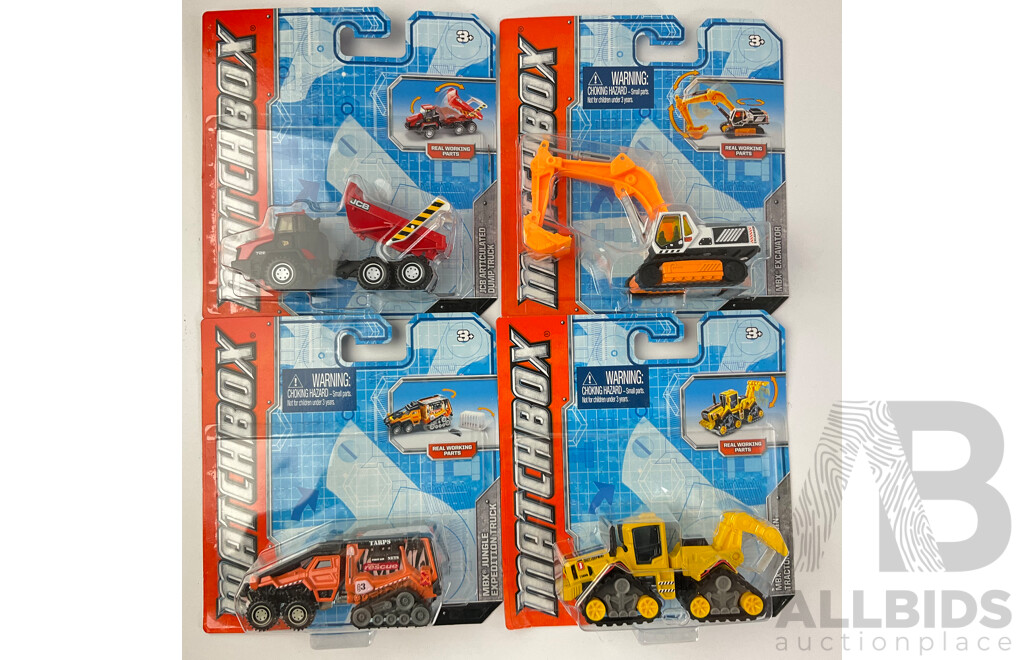 Collection of Boxed Diecast Matchbox 60th Anniversary Editions with Trucks and Construction Vehicles