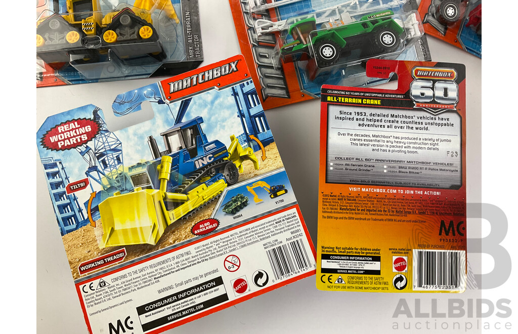 Collection of Boxed Diecast Matchbox 60th Anniversary Editions with Trucks and Construction Vehicles