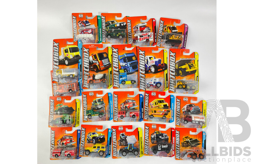 Collection of Twenty Boxed Diecast Matchbox Trucks, Vans and Tractors