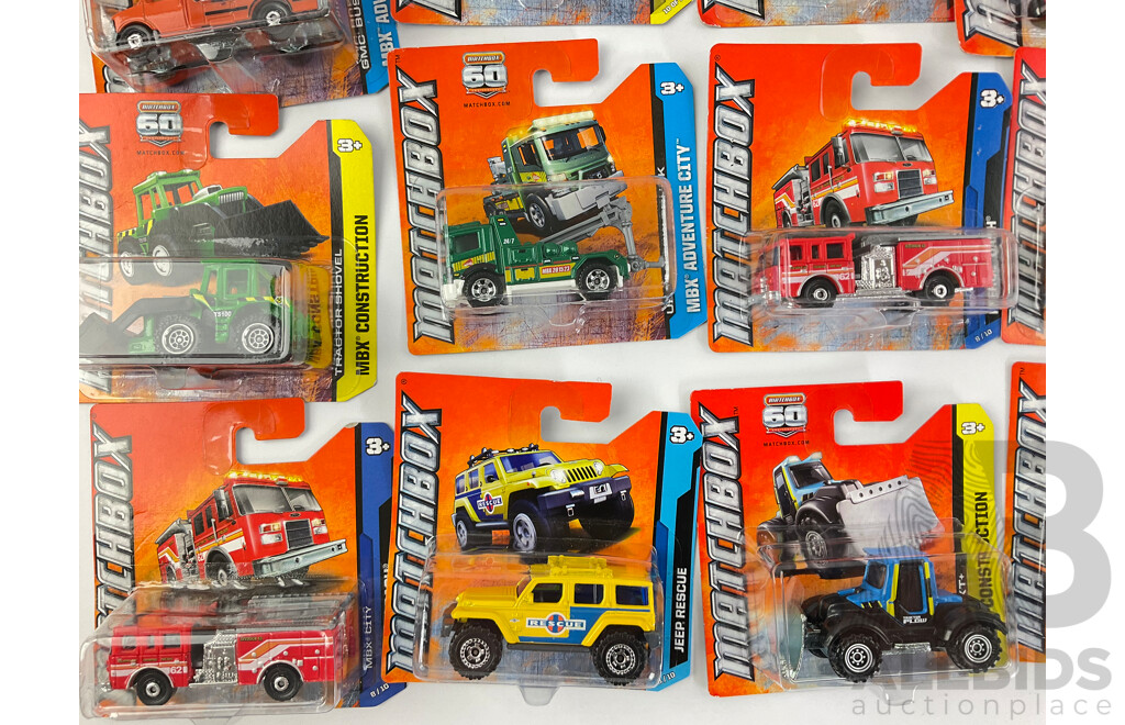 Collection of Twenty Boxed Diecast Matchbox Trucks, Vans and Tractors