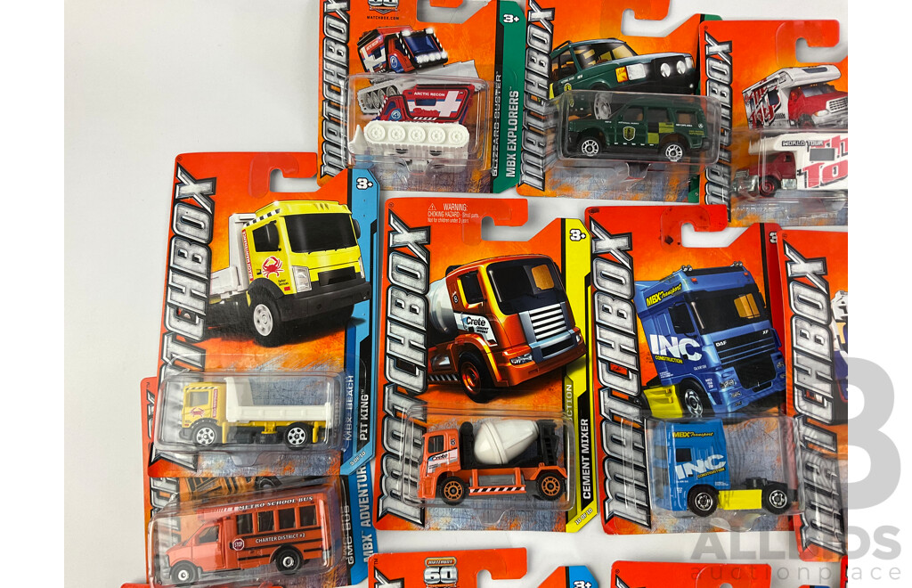 Collection of Twenty Boxed Diecast Matchbox Trucks, Vans and Tractors