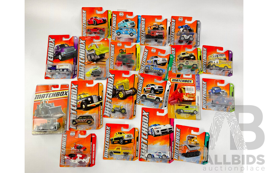 Collection of Twenty Boxed Diecast Matchbox Trucks, Tractors and Cars