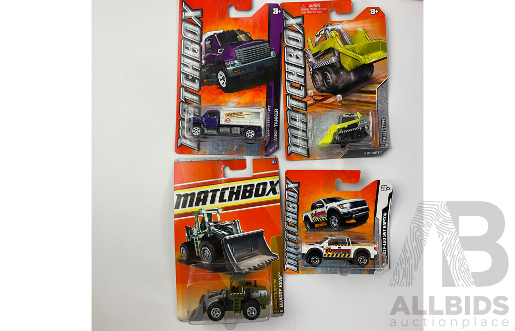 Collection of Twenty Boxed Diecast Matchbox Trucks, Tractors and Cars