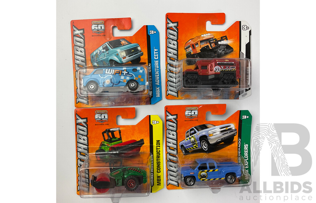 Collection of Twenty Boxed Diecast Matchbox Trucks, Tractors and Cars