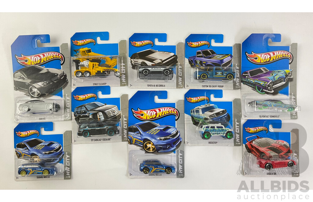 Ten Boxed Diecast Hot Wheels HW City Vehicles Including Subaru WRX STI, Rockster, BMW M3