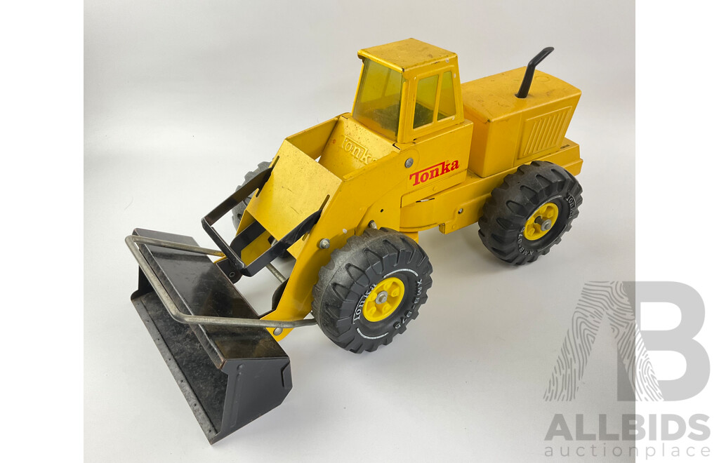 Three Pressed Steel Tonka Trucks and Tractor