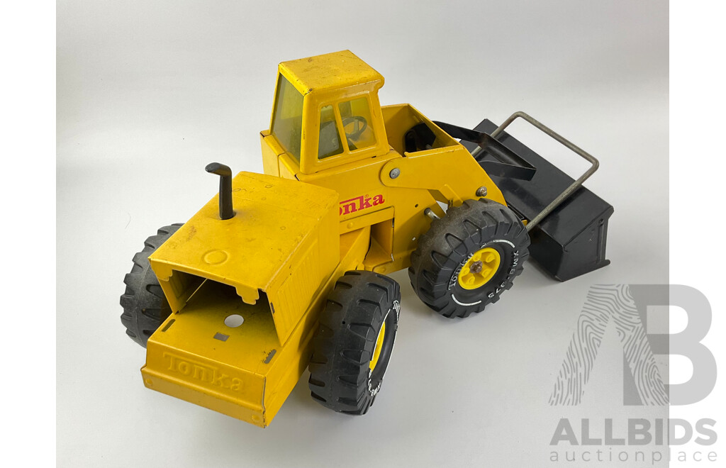 Three Pressed Steel Tonka Trucks and Tractor