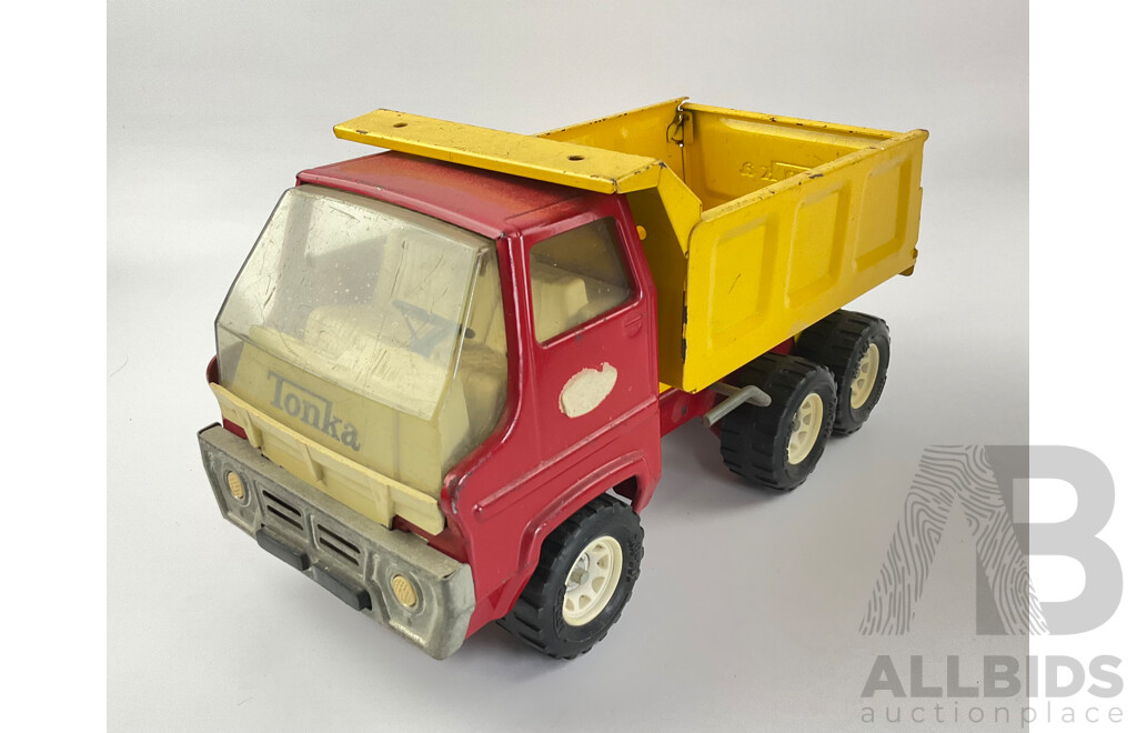 Three Pressed Steel Tonka Trucks and Tractor