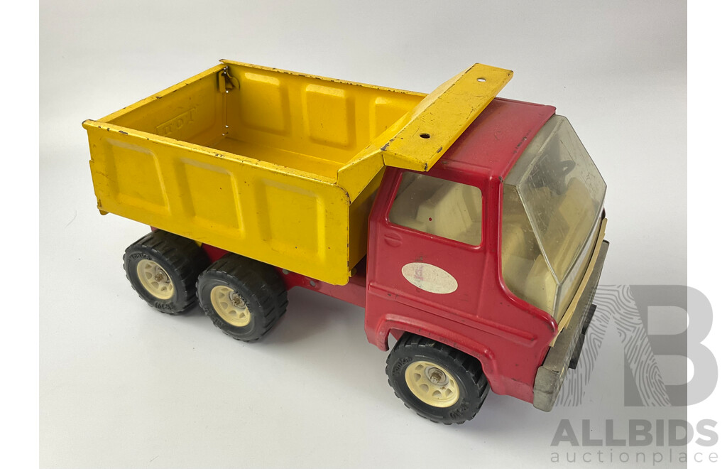 Three Pressed Steel Tonka Trucks and Tractor