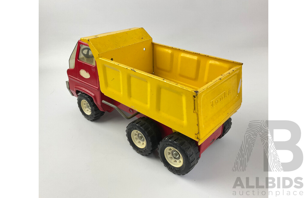 Three Pressed Steel Tonka Trucks and Tractor