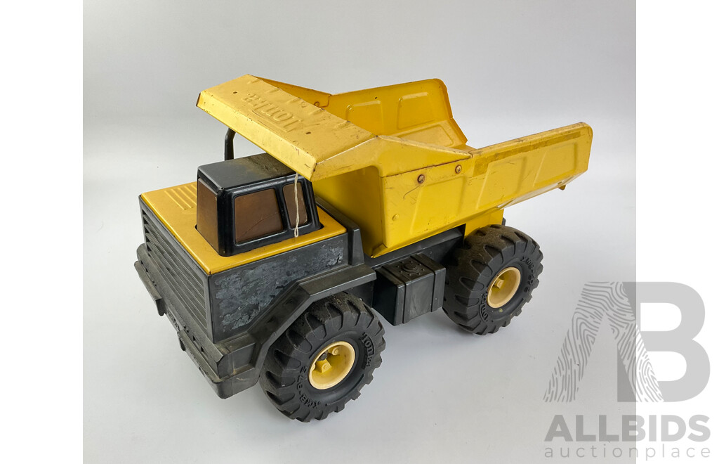 Three Pressed Steel Tonka Trucks and Tractor